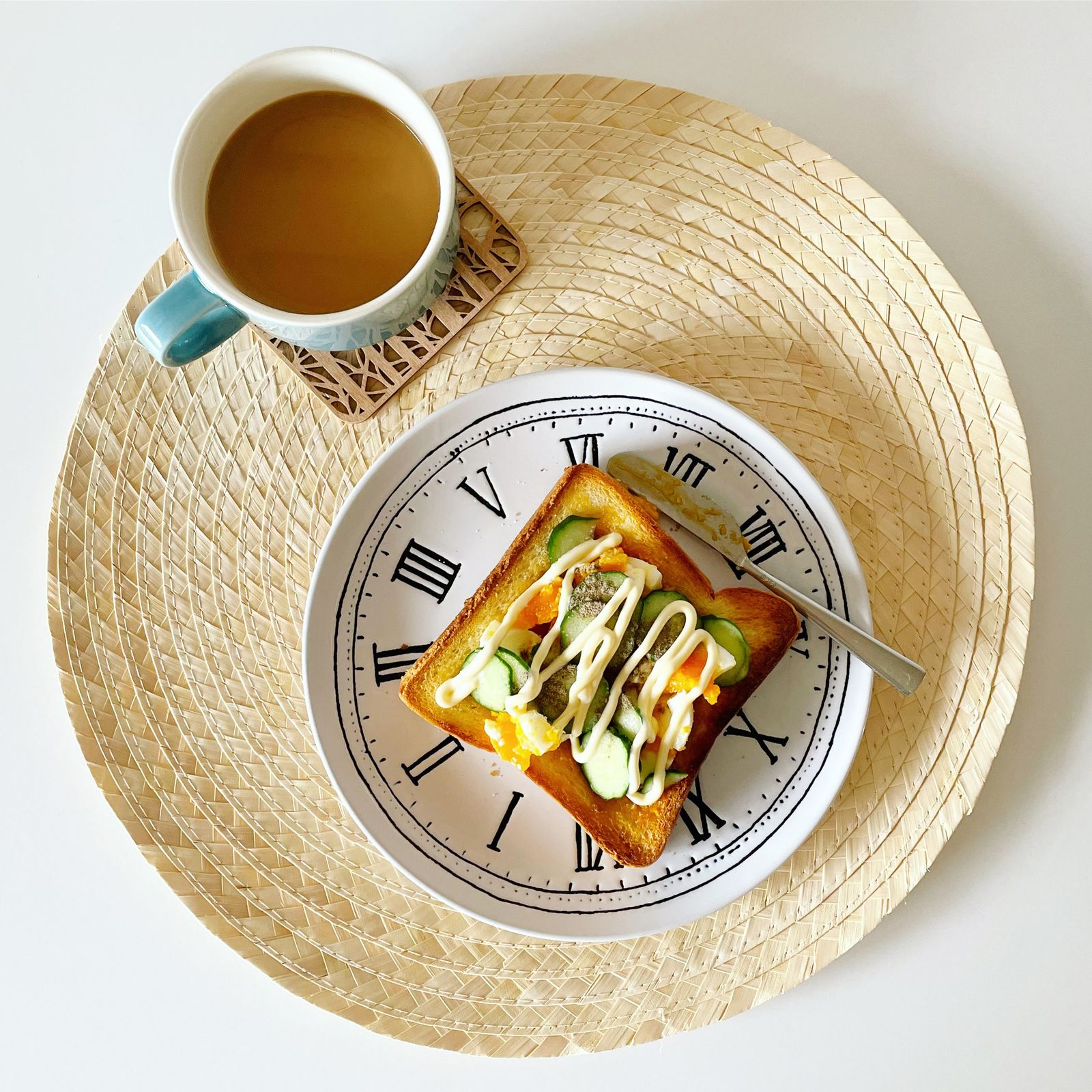A breakfast of toast and a cup of coffee on a café table